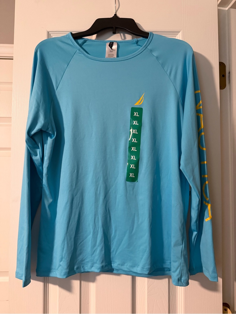 Nautica Swim Women’s Long-Sleeve Performance Tee in Sky Blue with Yellow Accents